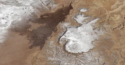 High-altitude circular tracking shot of the El Malpais range Stock Footage 97453511
