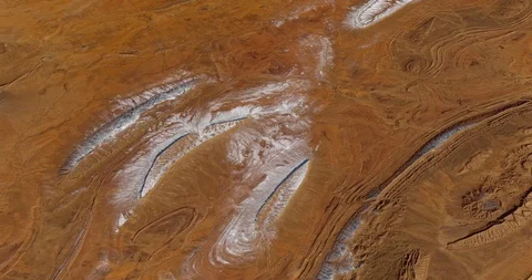 High-altitude circular tracking shot of desert terrain, Algeria Stock Footage 97464114