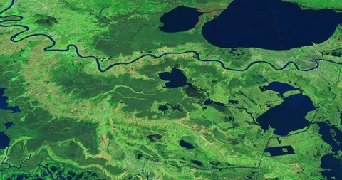 High-altitude circular tracking shot of the Mississippi delta Stock Footage 97657780