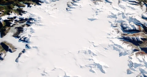 High-altitude circular tracking shot of glaciers in the Patagonian alps Stock Footage 97669888