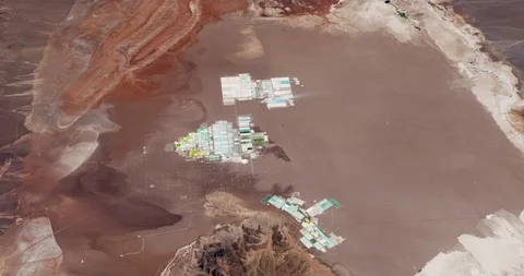 High-altitude circular tracking shot of lithium evaporation ponds in Chile Stock-Footage 118461432