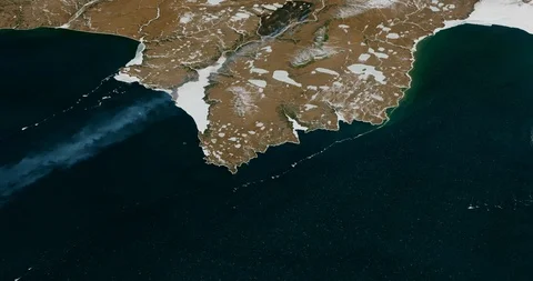 High-altitude circular tracking shot of Gizhigin Bay, south coast of Siberia Stock Footage 118463815