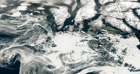 High-altitude circular tracking shot of ice in the Labrador Sea off Greenland Stock-Footage 118464344