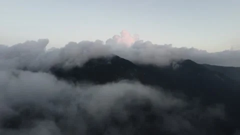 High Altitude Cloud Sea Aerial Drone View with Rolling Fog and Endless Sky Stock Footage 326775321