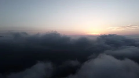 High Altitude Cloud Sea Aerial Drone View with Rolling Fog and Endless Sky Stock Footage 326775348