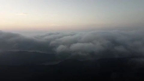 High Altitude Cloud Sea Aerial Drone View with Rolling Fog and Endless Sky Stock Footage 326775413