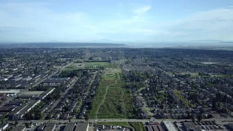 A High Altitude Dolly Shot of Dense Mixed Commercial Residential Cityscapes Stock Footage 89848591