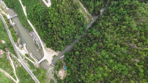 High Altitude Drone Approaching Forest and Lake from Above in 4K Video stock 338297807