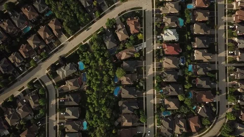 High altitude drone flight over a suburban community in summer. Video stock 90470730