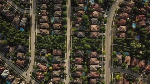 High altitude drone flight over a suburban community in summer. Video stock 90470789
