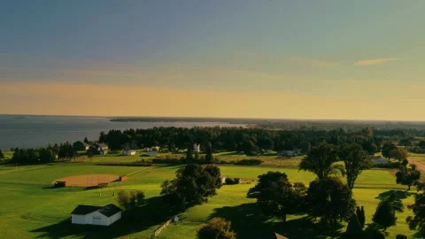 High Altitude Drone Flight Over Vibrant Green Fields The Coast Of Atlantic Ocean Stock Footage 255350183