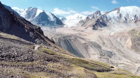 High altitude drone flight over Tuyuksu Glacier at 3200m Stock Footage 331526537