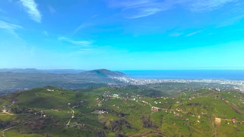 High Altitude Drone Flight Over Lush Green Valley with Light Morning Mist Stock-Footage 340253221