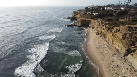 High-Altitude Drone Flyover of San Diego Coastline at Golden Hour Stock Footage 312768044