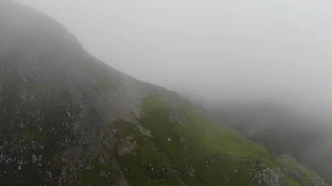High altitude drone footage from Glencoe in Scotland showing the mountain range Stock Footage 285387162