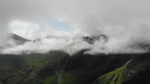 High altitude drone footage from Glencoe in Scotland showing the mountain range Stock Footage 285388127