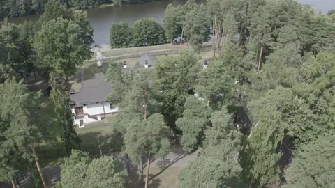 High altitude drone orbit above park and river Stock Footage 333484698