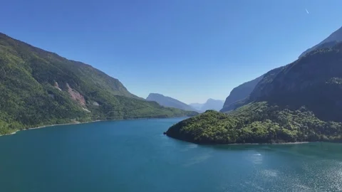 High Altitude Drone Pan of Lago di Molveno and Surrounding Alpine Wilder Stock Footage 337863806