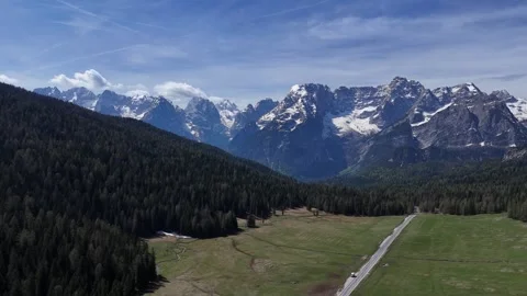 High Altitude Drone Pullout From Towering Limestone Peaks Across Alpine Stock Footage 340947074