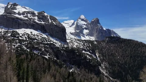 High Altitude Drone Push Over Forested Ravine Revealing Sharp Mountain C Stock Footage 340053227