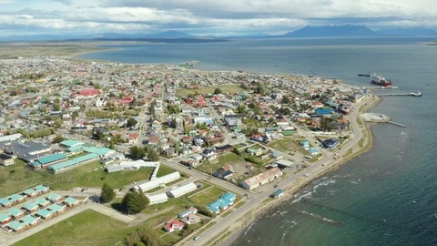High Altitude Drone Shot Orbiting the City of Puerto Natales Stock Footage 100642942