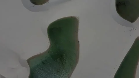 High altitude drone view expanding over lagoon and dunes, Lençóis Maranhenses Video stock 328190208