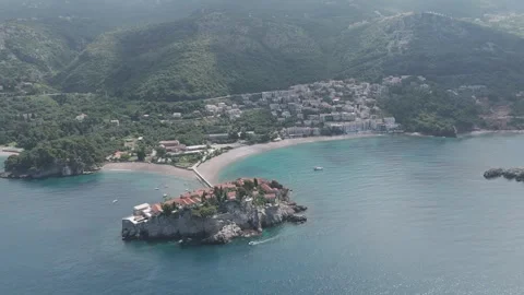 High Altitude Drone View of Sveti Stefan, Surrounding Town, and Mountains – Mont Stock-Footage 310335353
