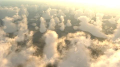 High altitude flight above the clouds at sunset or sunrise Stock Footage 124379810