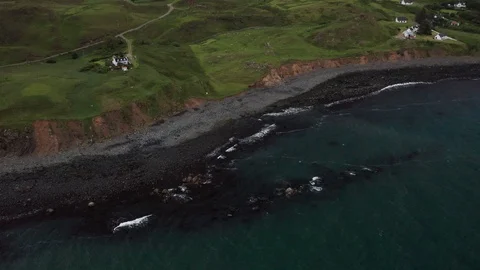 High altitude flight over the beach on the coastline of Isle of Skye Stock Footage 116109230
