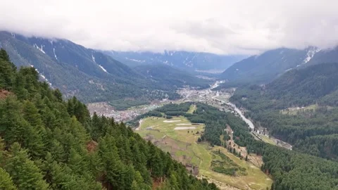 High-altitude forward drone flight over Pahalgam valley and Lidder river. Видео 333796748
