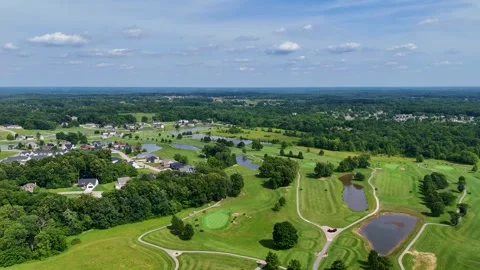 High Altitude Forward Drone Flight Over Wide Suburban Golf Course 動画素材 337637652