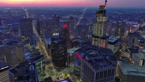 High altitude left-to-right pan shot, downtown Detroit during sunset Stock Footage 287620441