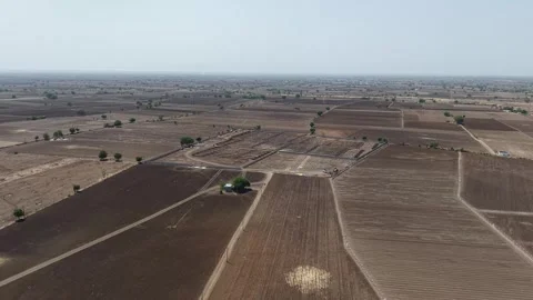 High altitude long shot tracking an industrial zone designated for a renewable Vídeo Stock 337247296