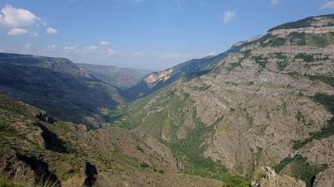 High-altitude mountain panorama with dramatic cliffs and sparse greenery Stock Footage 339567209