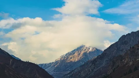 High Altitude Mountain Range Under Bright Daylight Timelapse Stock Footage 330440194