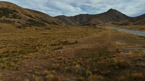 High Altitude Mountain Valley with Alpine Stream Stock Footage 341606892