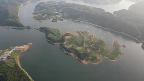 High Altitude Orbit Drone View of a Green Island in South Korea Stock Footage 343194215