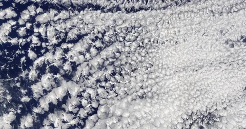 High-altitude overflight aerial of clouds over the Pacific Ocean. Stock Footage 69946067