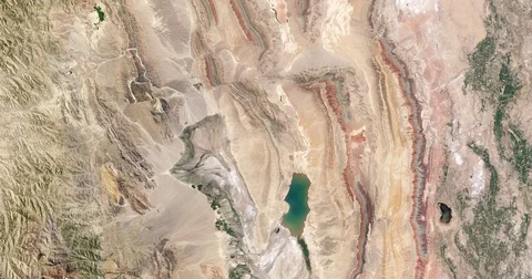 High-altitude overflight aerial, thrust belt rock layers Xinjiang province China Stock Footage 70823109