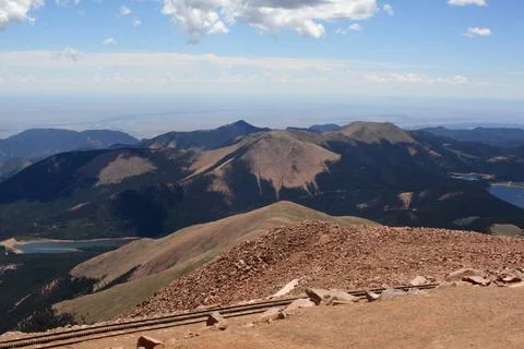 High-Altitude Panoramic View from Pikes Peak Summit Over Mountain Ranges Stock Photos