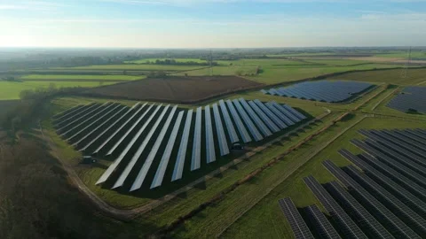 High altitude perspective of a large scale photovoltaic array in rural UK Stock-Footage 329543995