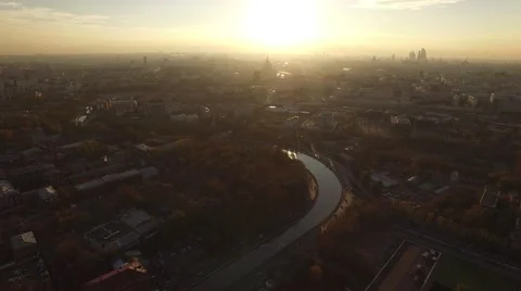 High altitude quadcopter flight over Moscow city center. Strong epic sunset view Video stock 64125834