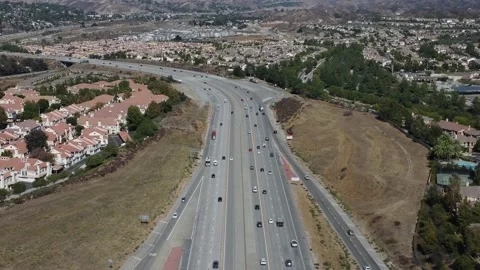 High altitude reverse shot of Highway 14 near Sierra Hwy offramp Stock Footage 218629752