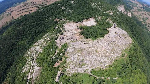 High-Altitude Rotating Lateral Flight Over Perperikon Stock Footage 321554350