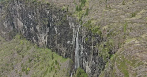 High-Altitude Shot of a Beautiful Waterfall in the Dolomite Alps, Italy Stock Footage 281925200