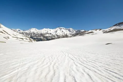 High altitude snow melting pattern Stock Photos