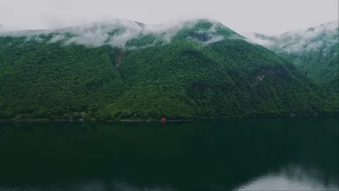 High-altitude terrain. Mountain in the clouds. High peak. Clouds around the peak Stock-Footage 263443111