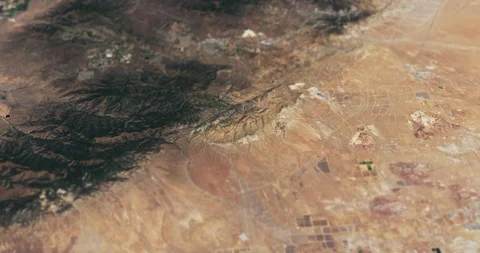 High-altitude tracking shot, Cameron Ridge, San Joaquin Valley, w/ tilt-shift Stock Footage 118523860