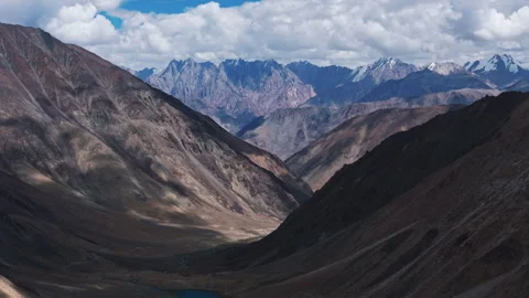 High Altitude Valley Between Steep Mountains Aerial View Stock Footage 311047410