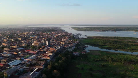High altitude view of Iquitos, largest city in the Peruvian rainforest, nestled Stock Footage 324362798
